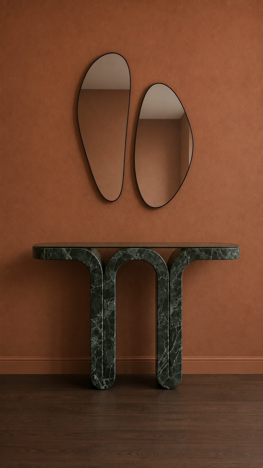 Pair of organic shaped mirrors above a marble console table in an entrance hall