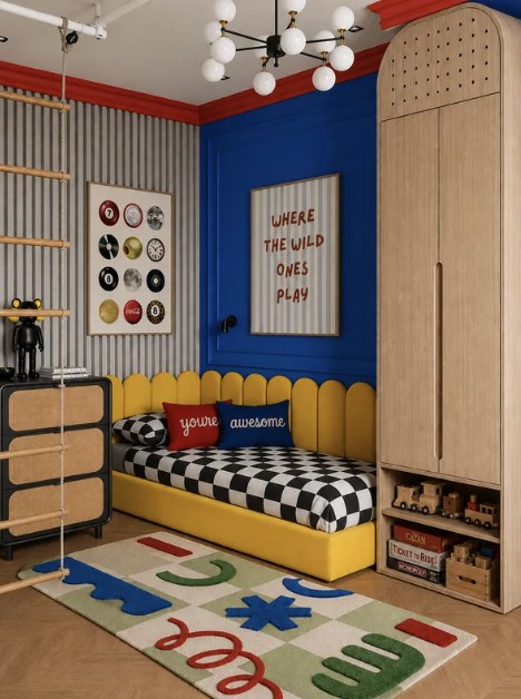 Boys bedroom with a framed typographic print and a retro icon gallery print above a built in bed